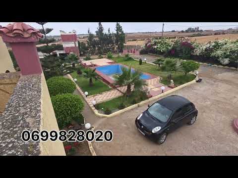 بيع لظروف🚨فيرمة مسجلة ومحفظة للبيع بين بوزنيقة و بنسليمان 🚨🇲🇦مسبح ڤيلا أشجار متنوعة موقع استراتيجي 1